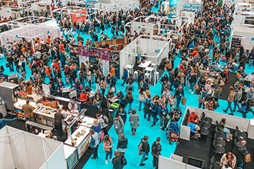 a busy exhibition aisle